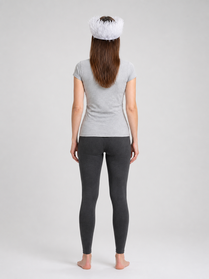 White feather headpiece shown from the back on a full-body model, revealing the feathered crown and band