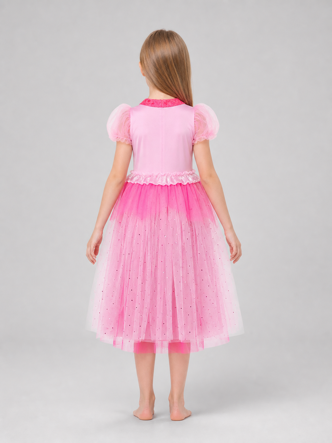 A bright pink Princess Peach costume created for transforming into a fairytale