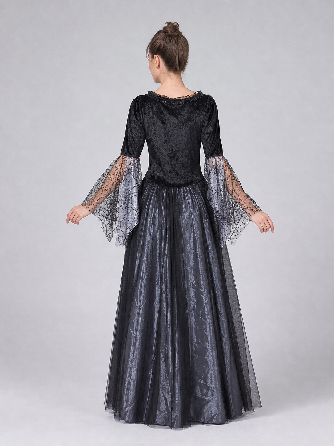 The gray-and-black witch costume is designed in a retro style and includes a back view