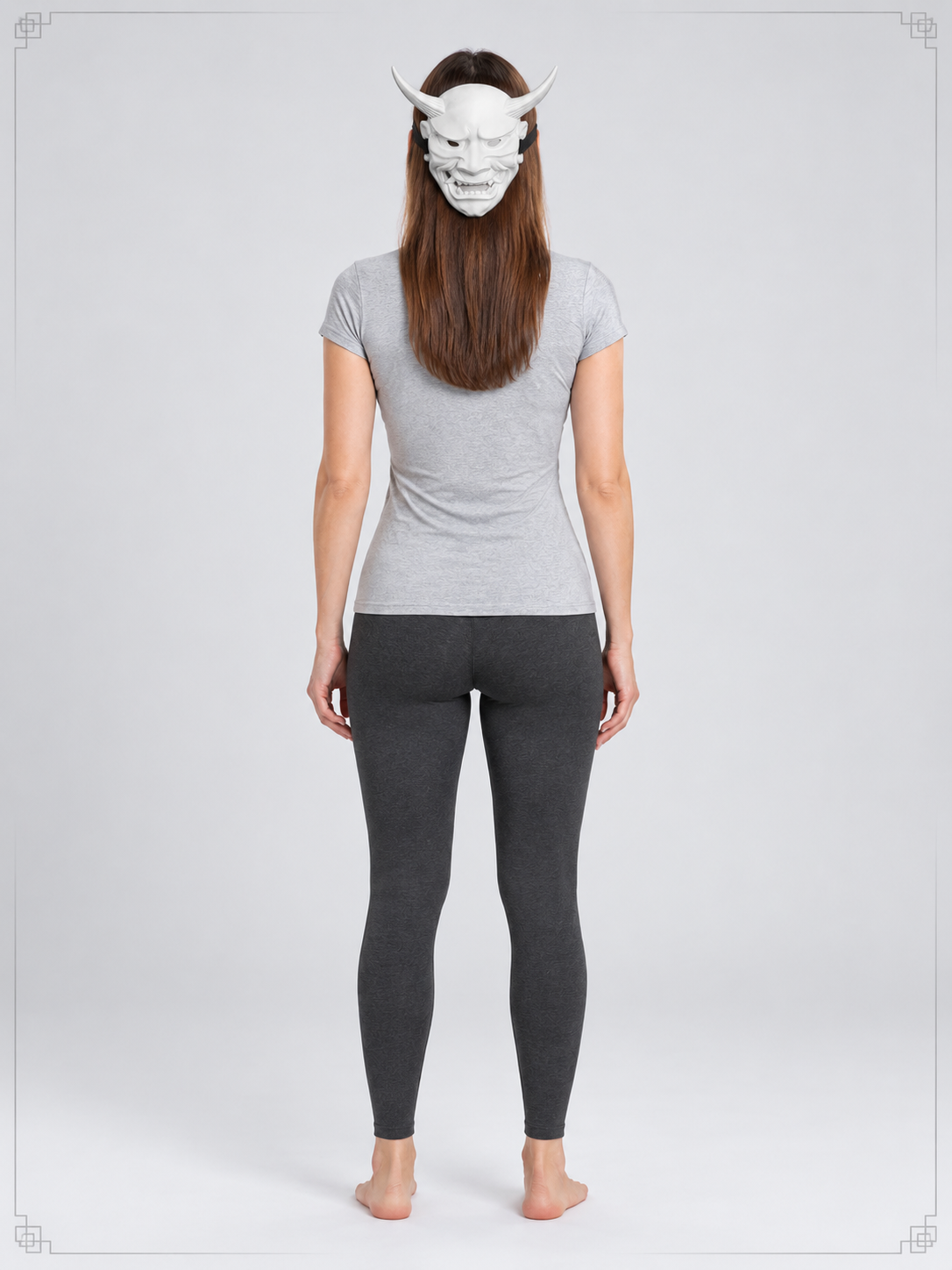 White demonic mask with horns and fangs
