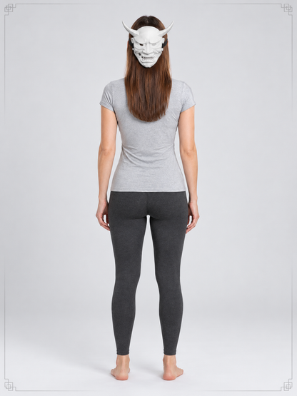 White demonic mask with horns and fangs