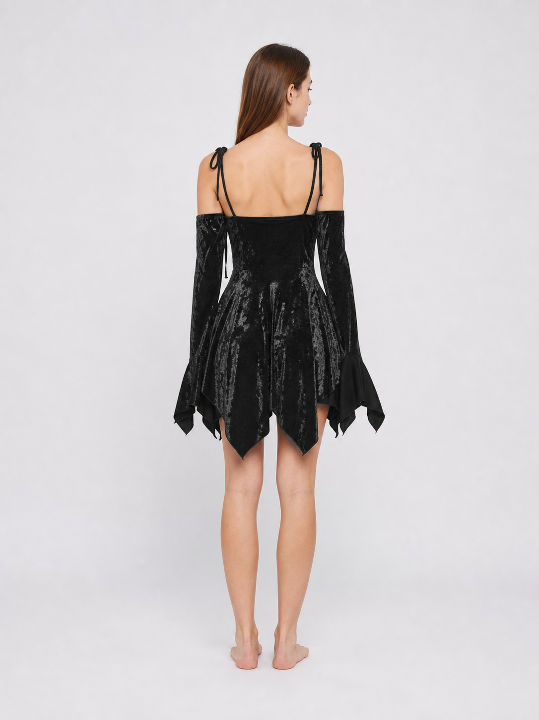 Black Mini Dress with an Asymmetrical Hem and Sleeves