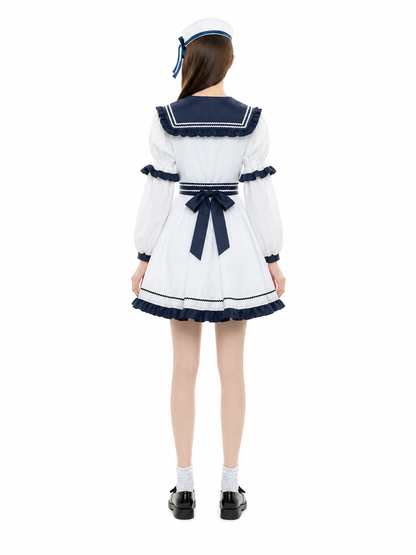 Dress with a Sailor Collar, Ruffles, and Bows back view