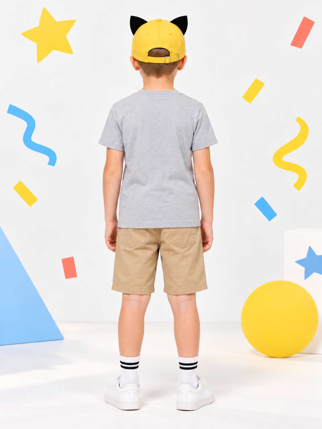 Yellow baseball cap with black ears and patch