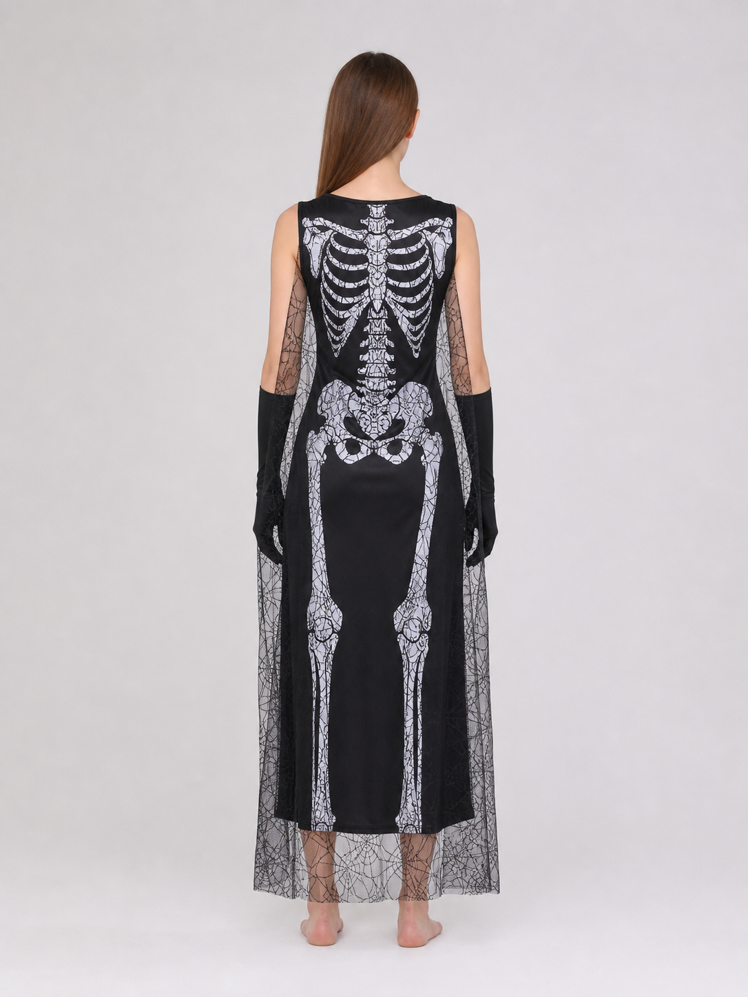 Gothic-style Halloween costume with dress and accessories: a black sleeveless