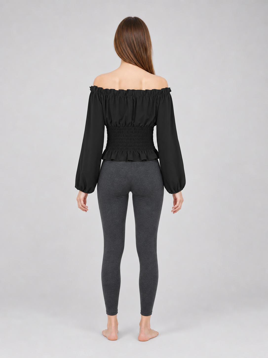 Black off-the-shoulder blouse with ruffles