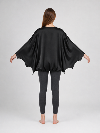 Black bat costume dress with a headband and ears for themed events. The design back view 2
