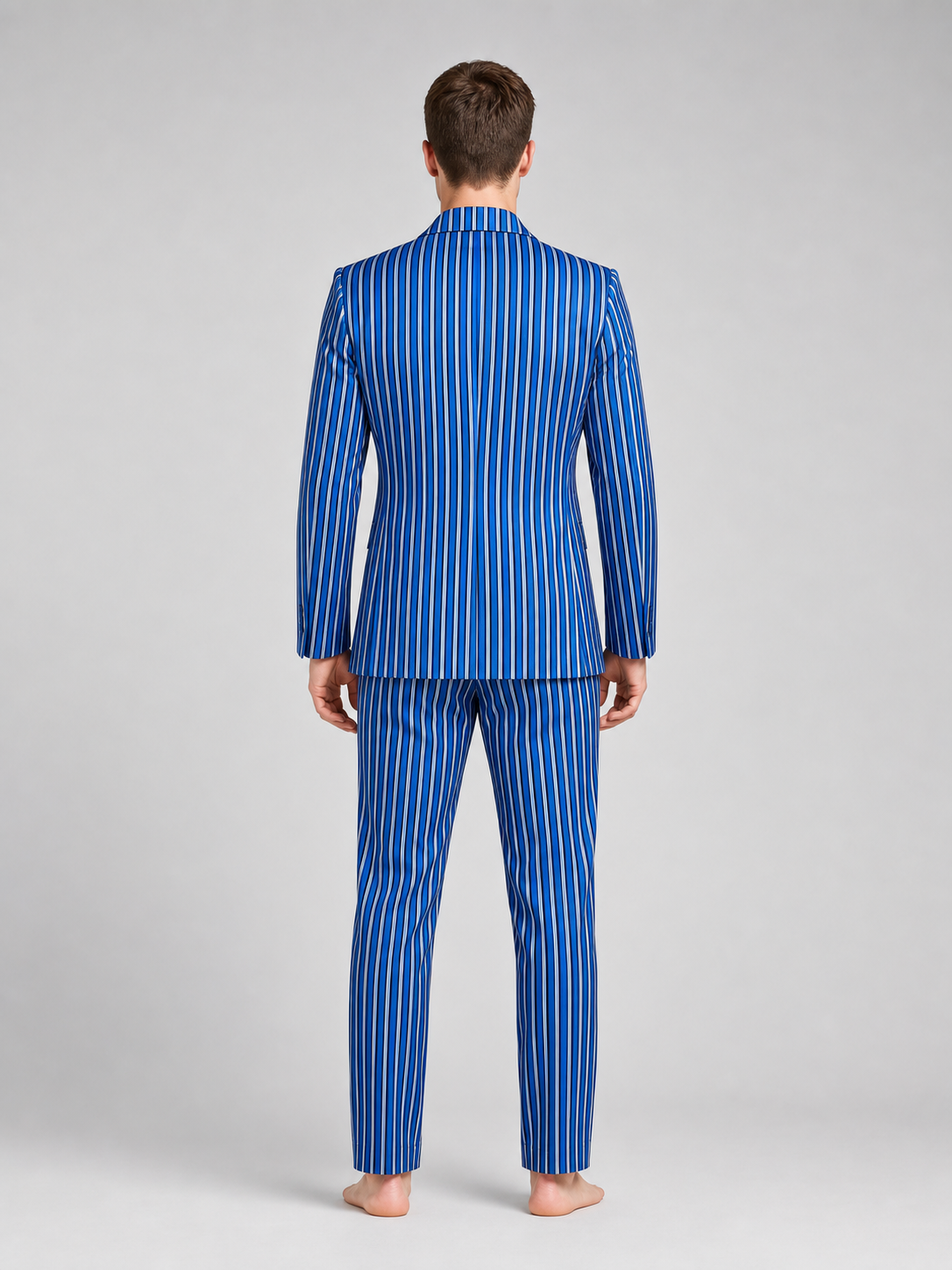 The Doctor Who cosplay double-breasted suit is designed in a white-and-blue color scheme with vertical stripes. The set includes a jacket and pants made in the same design. The jacket features a double-breasted closure, peaked lapels, and f