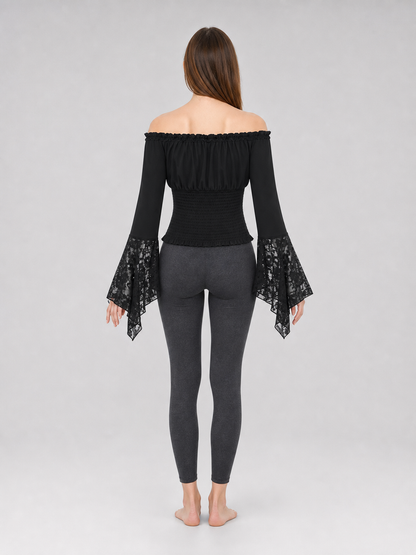 Black off-the-shoulder blouse with ruffles and long sleeves