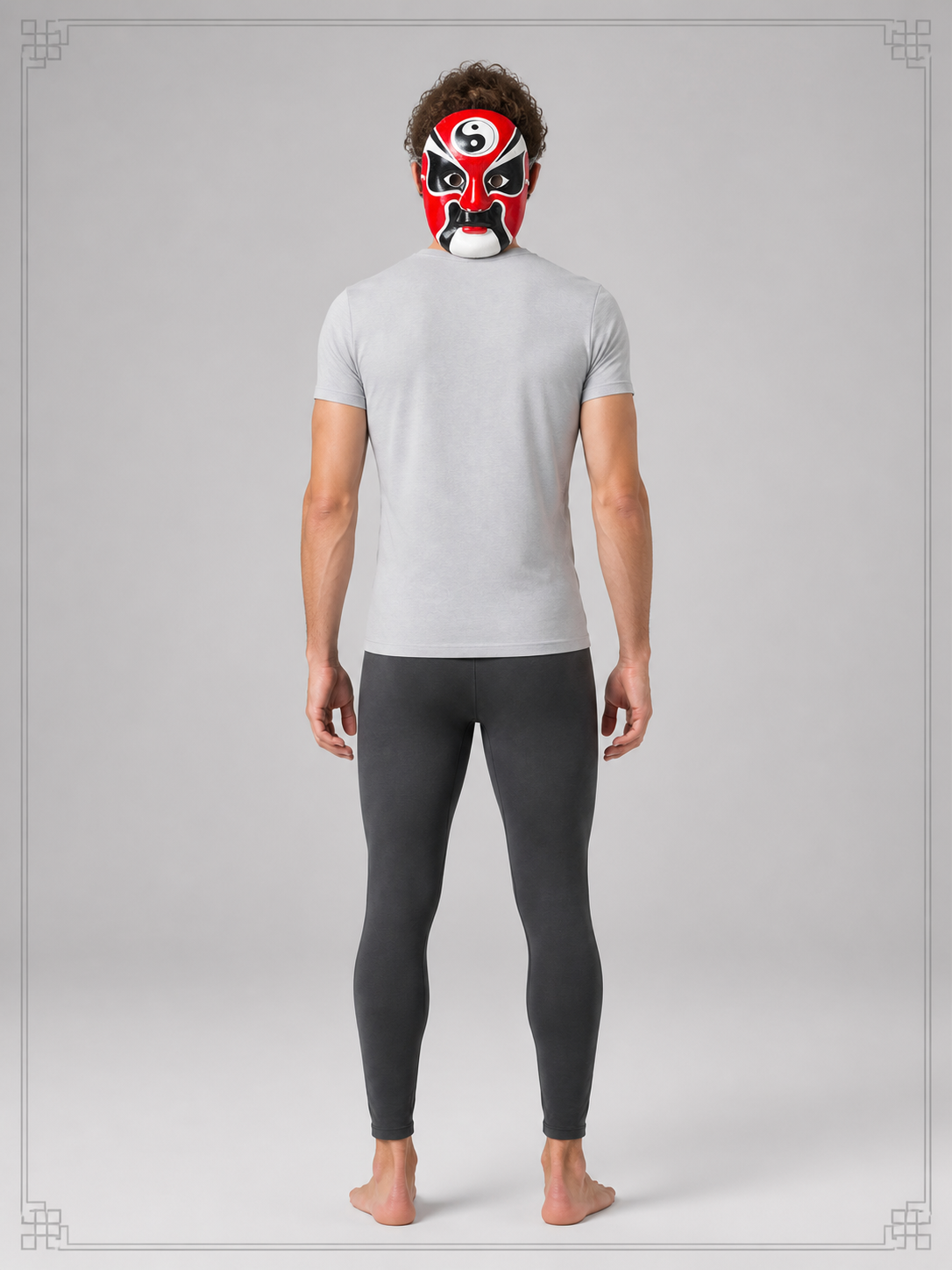 Carnival mask with a red, black, and white face for Halloween