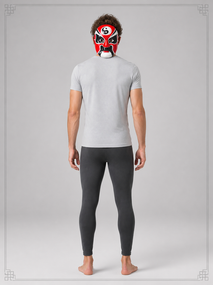 Carnival mask with a red, black, and white face for Halloween