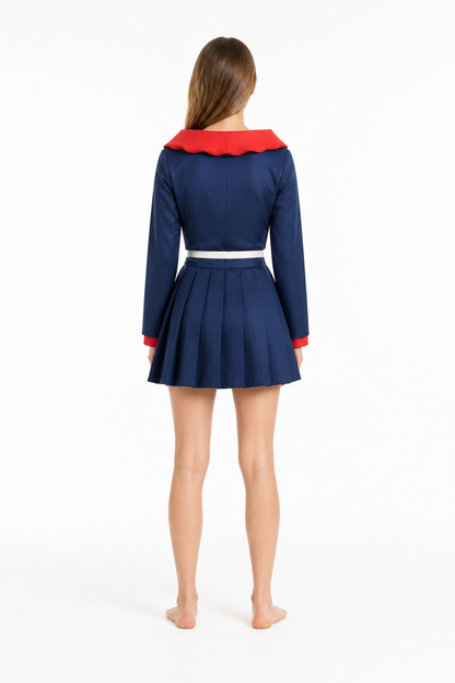 Anime cosplay costume with a pleated skirt, blue and red back view