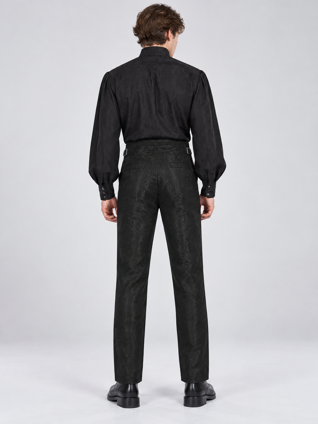 Black cosplay pants with a raised pattern
