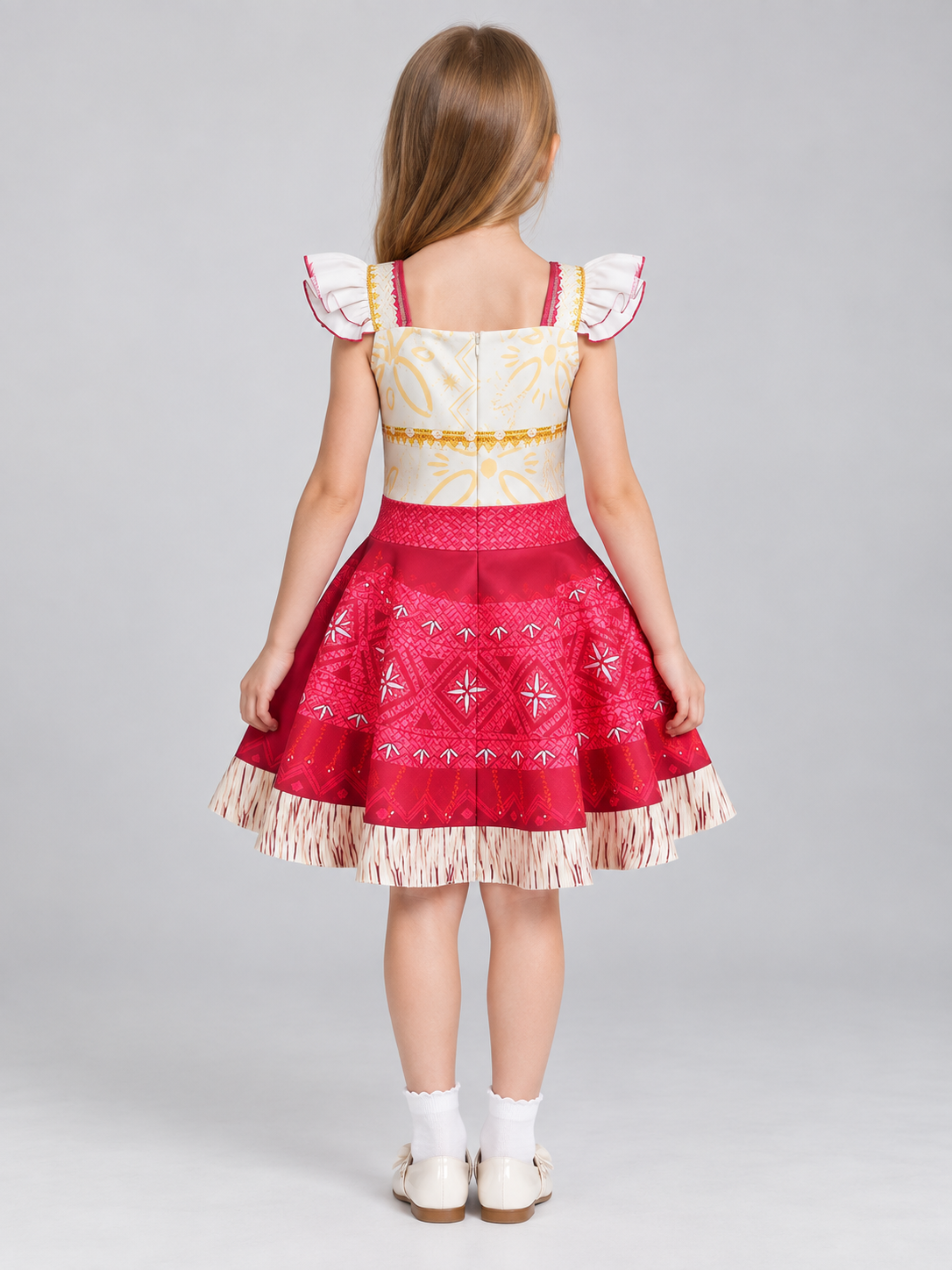 Dress with a white bodice, red skirt, and fringe