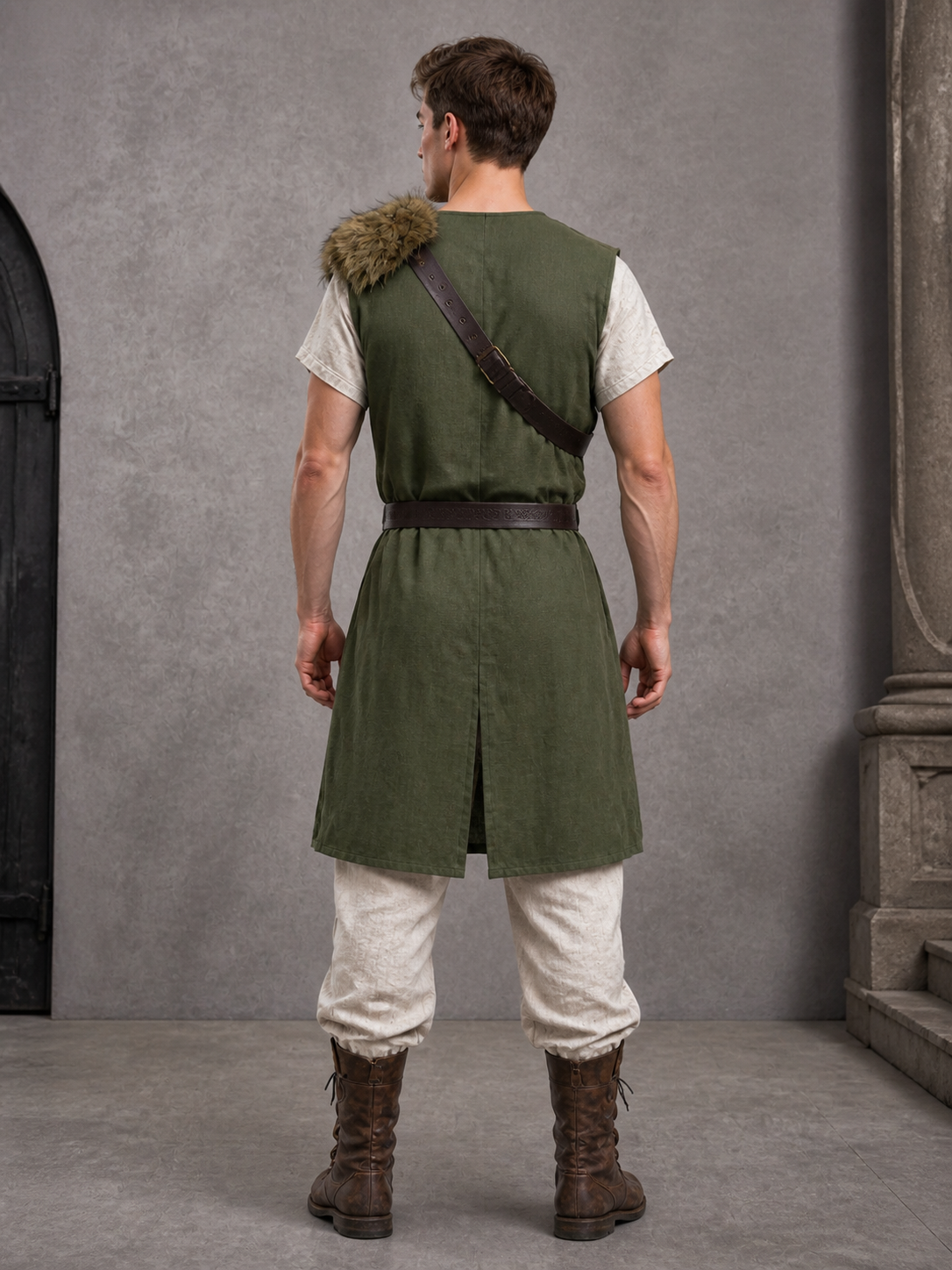 Back view of a green sleeveless vest showing the brown cross-body strap, waist belt and center back slit