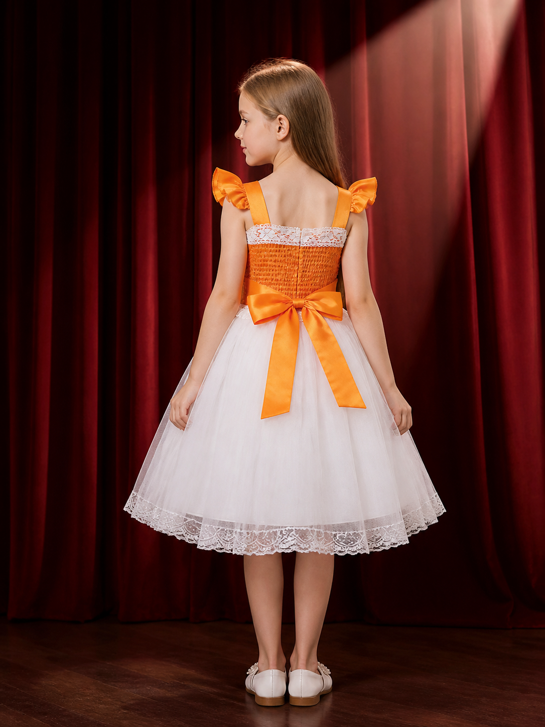 Girls' Orange and White Princess Dress with Puff Sleeves and Lace Trim back view