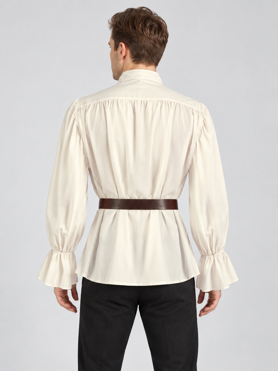 Beige shirt with a jabot, puffed sleeves, and a belt
