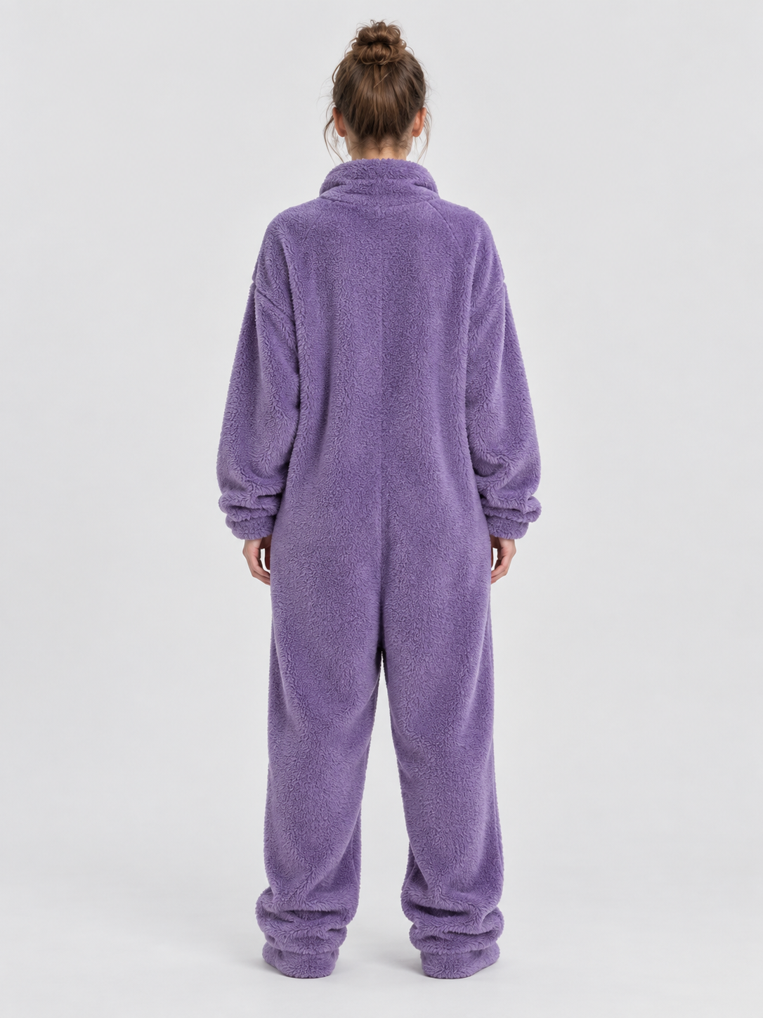 Insulated purple pajama jumpsuit with puffy eyes