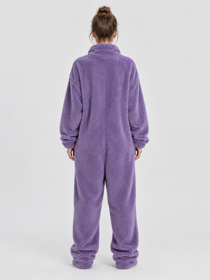 Insulated purple pajama jumpsuit with puffy eyes