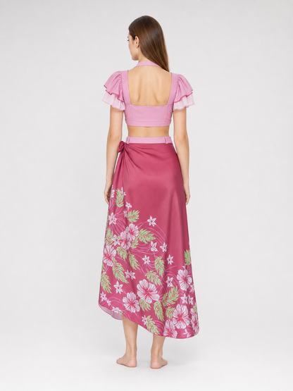 This cosplay set is designed as a short-sleeve crop top and a long skirt. It includes a top, a half-skirt, and decorative bows. There is a bow on the chest of the top, and another bow is placed on the side of the skirt waist. The top has an