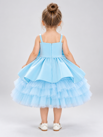 Blue children's holiday dress with a bow and a puffy skirt