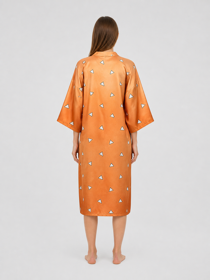 Back view of an orange satin-look robe with wide sleeves and scattered white triangle pattern