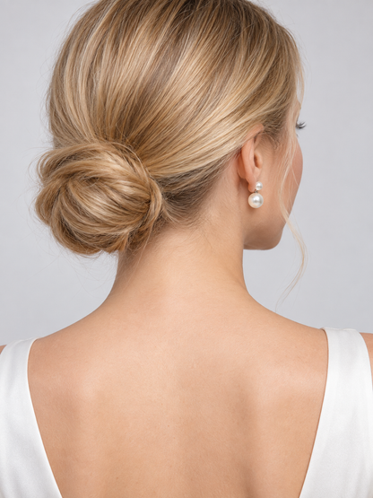 Earrings with white glossy round beads in two sizes