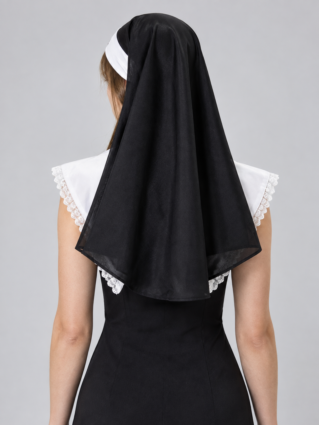 Black and white nun's headpiece with cross and veil