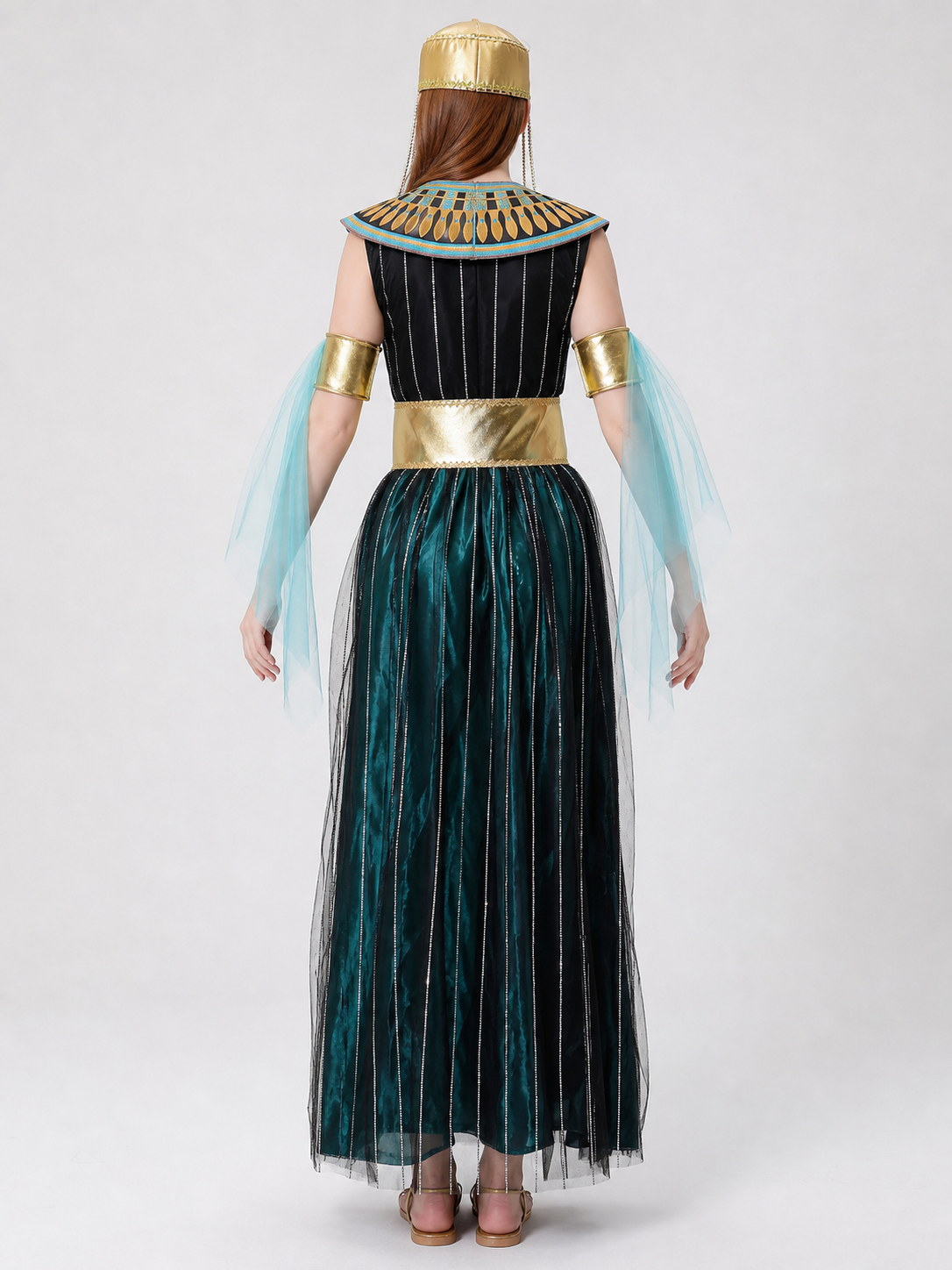 Cleopatra costume designed in an Egyptian-inspired style and decorated in a combination of black, gold, light blue, and blue-green colors. The outfit is centered around a black dress with a skirt and fitted upper section. Vertical sequin st