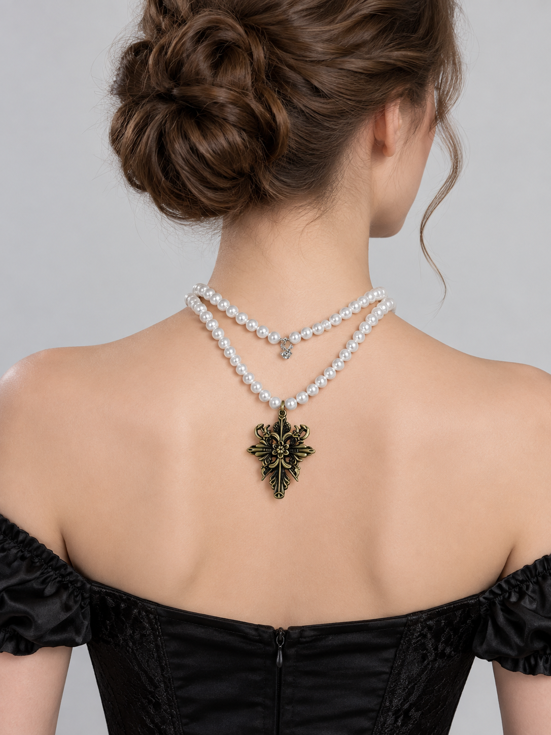 Two-Strand White Beaded Necklace with Bronze Cross