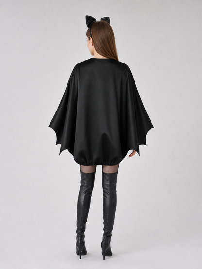 Black bat costume dress with a headband and ears for themed events. The design back view