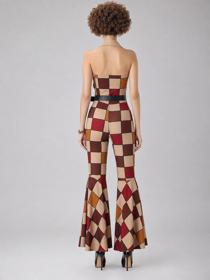 One-piece jumpsuit costume for themed looks and parties with a striking design. The model features a single silhouette that combines a top and pants. The strapless top with an open waistline is connected to high-rise pants, while the lower 