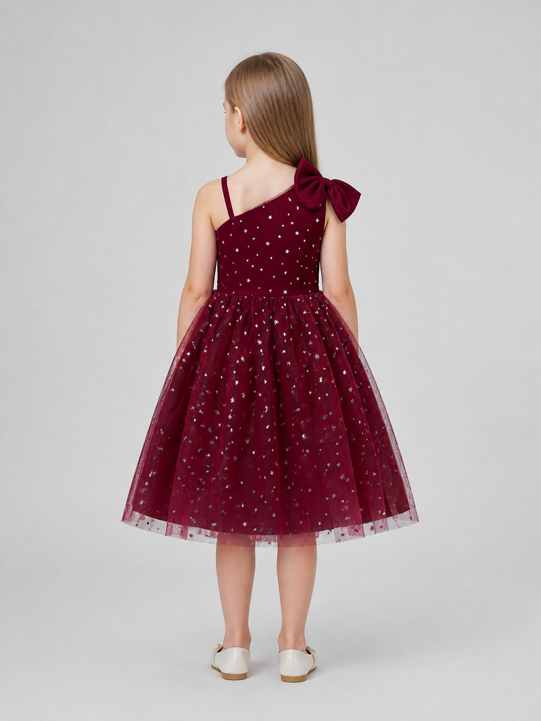 Princess Dress with a Tulle Skirt, Sequins, and Bow back view