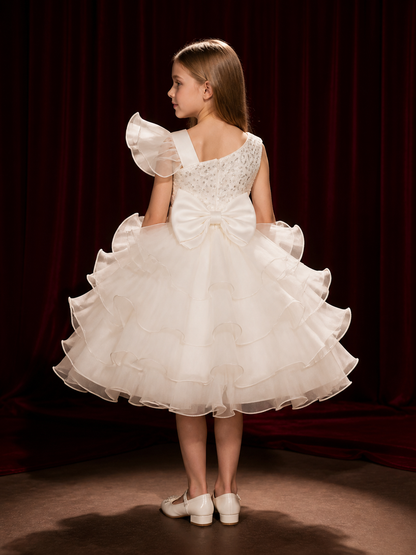 Girls' White Princess Dress with Sequins, Bow, and Layered Ruffle Skirt back view