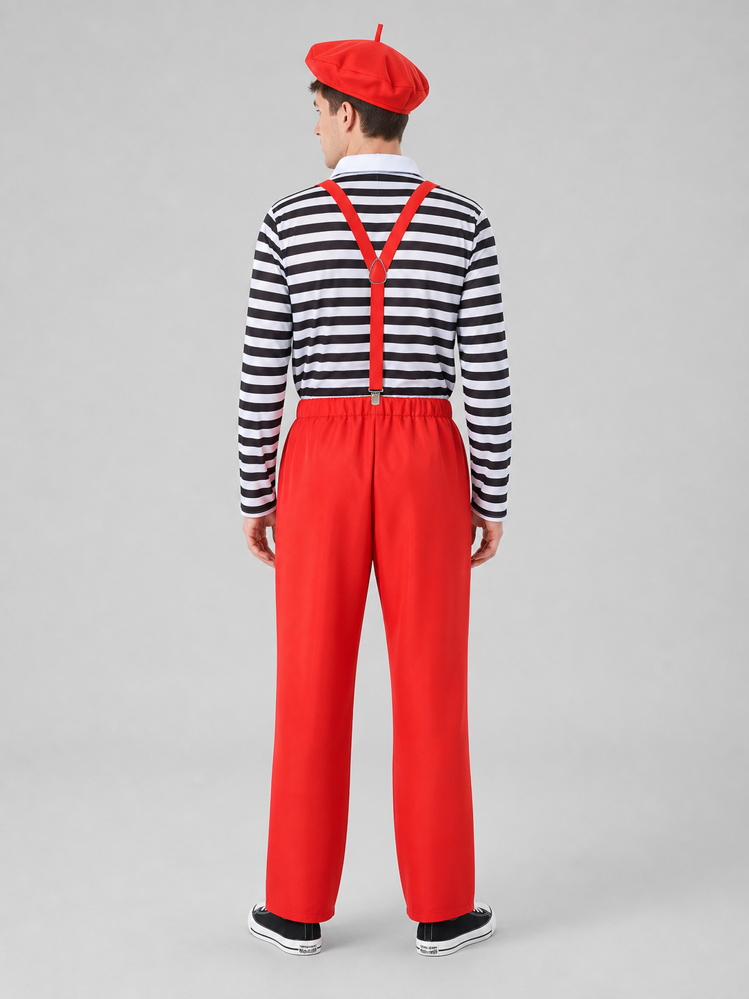 This bright clown costume is designed to create an expressive stage look and a festive transformation. The set includes a red cap with a short protruding crown, round glasses with red frames, a long-sleeve shirt with horizontal black-and-wh