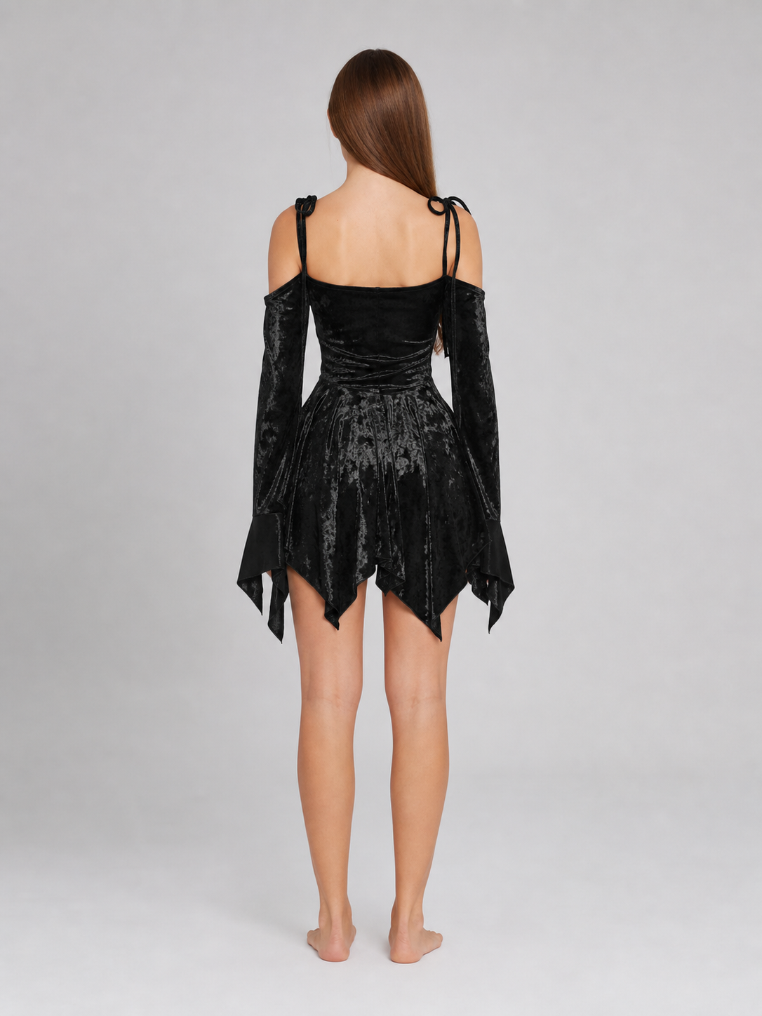 Black Mini Dress with an Asymmetrical Hem and Sleeves