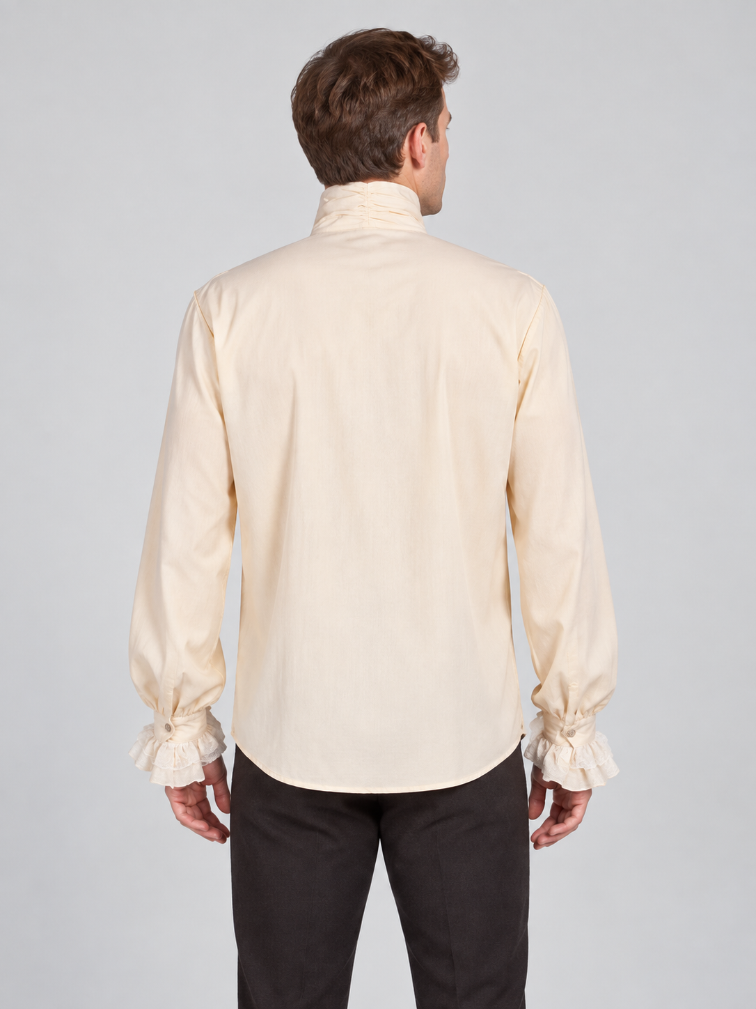 Light beige shirt with a high collar, jabot and ruffles