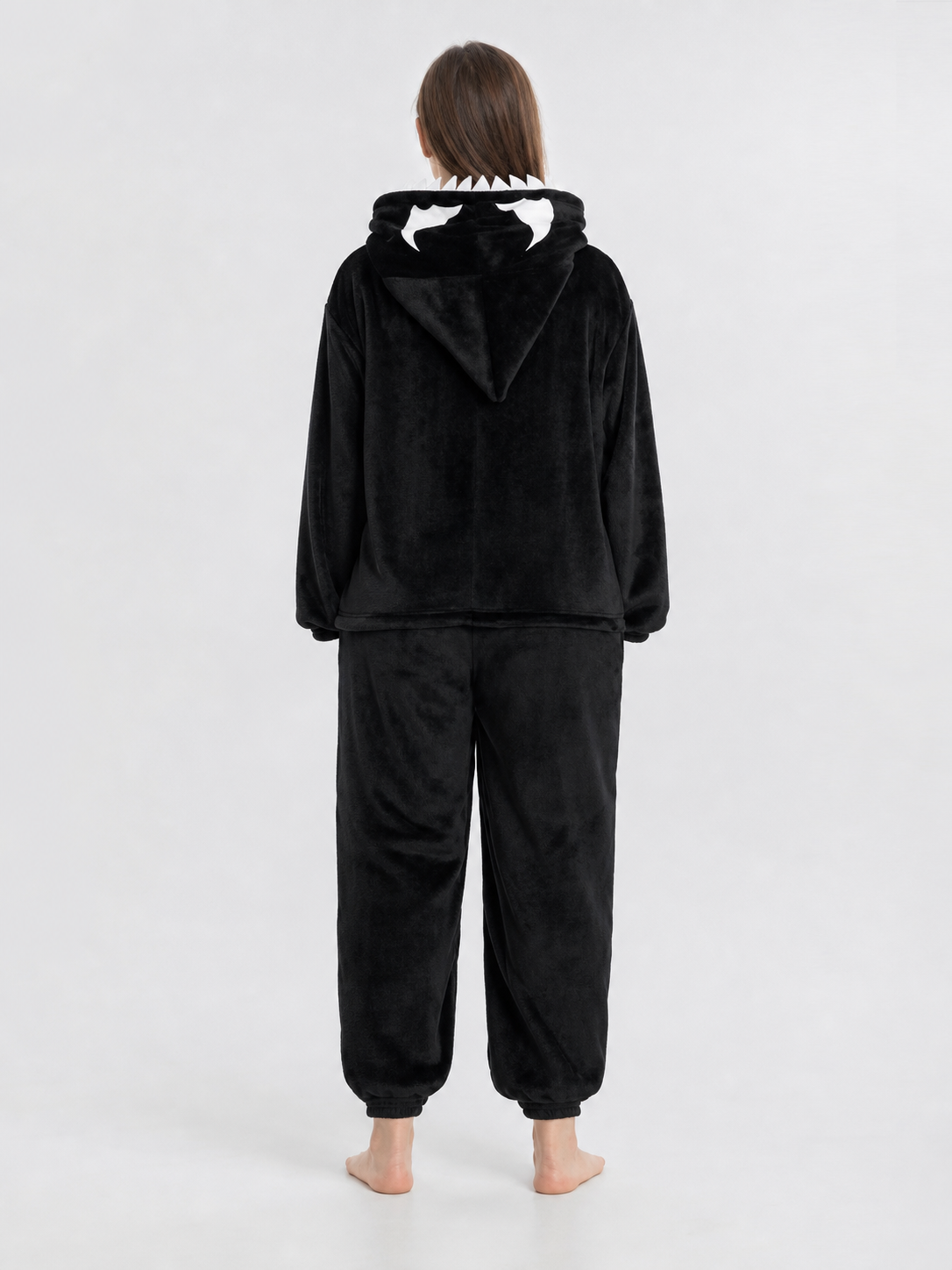 Hooded jumpsuit with zipper and spider print