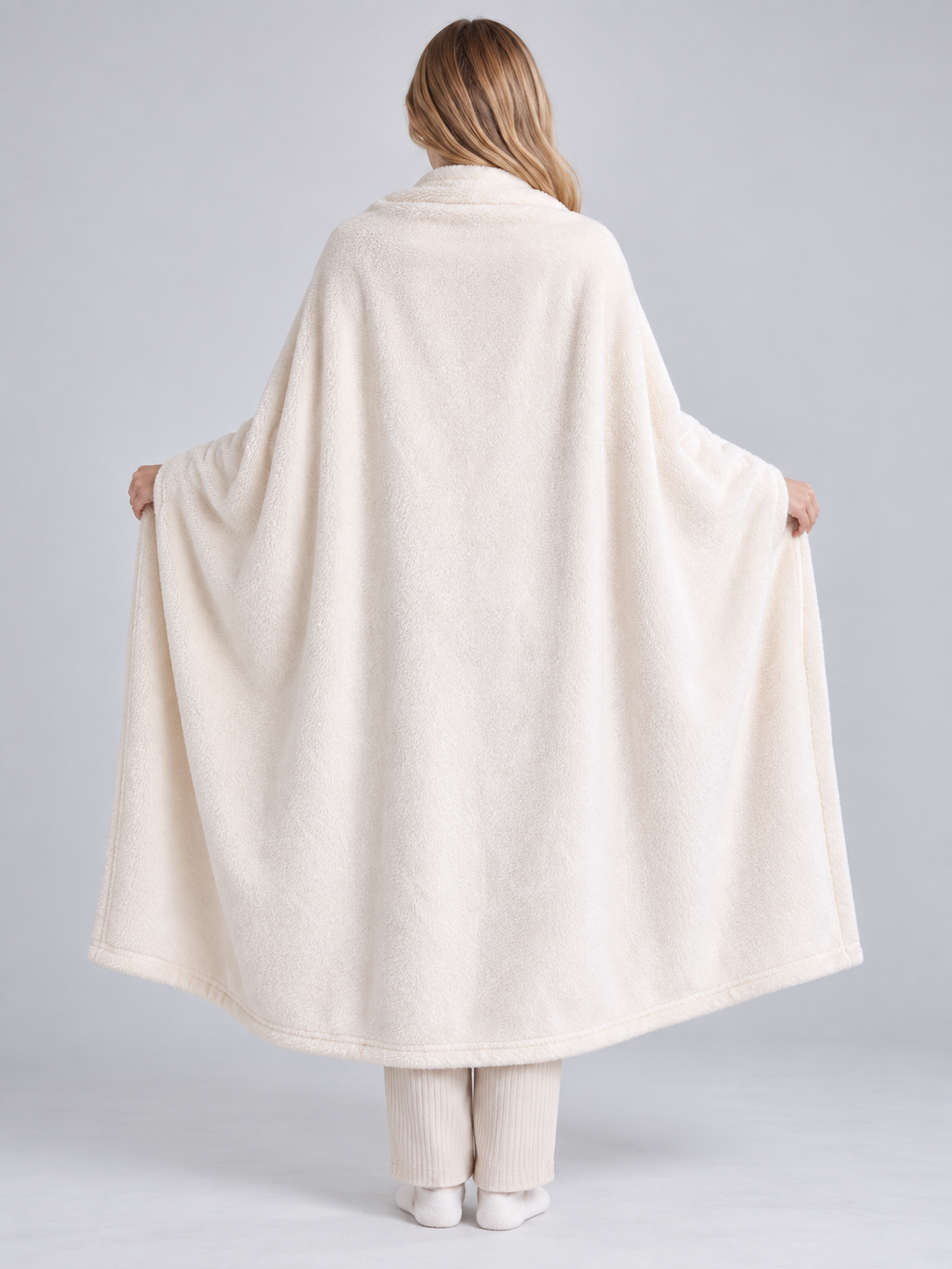 Solid light cream blanket with a fleece surface