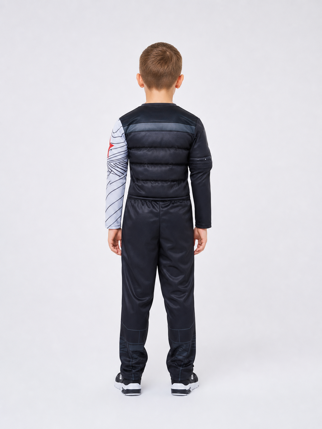 This superhero-style costume set is designed for eye-catching looks, role-play, and costume events. The set includes a one-piece jumpsuit with long sleeves and a mask or headpiece that covers the eye area. The design features an expressive 