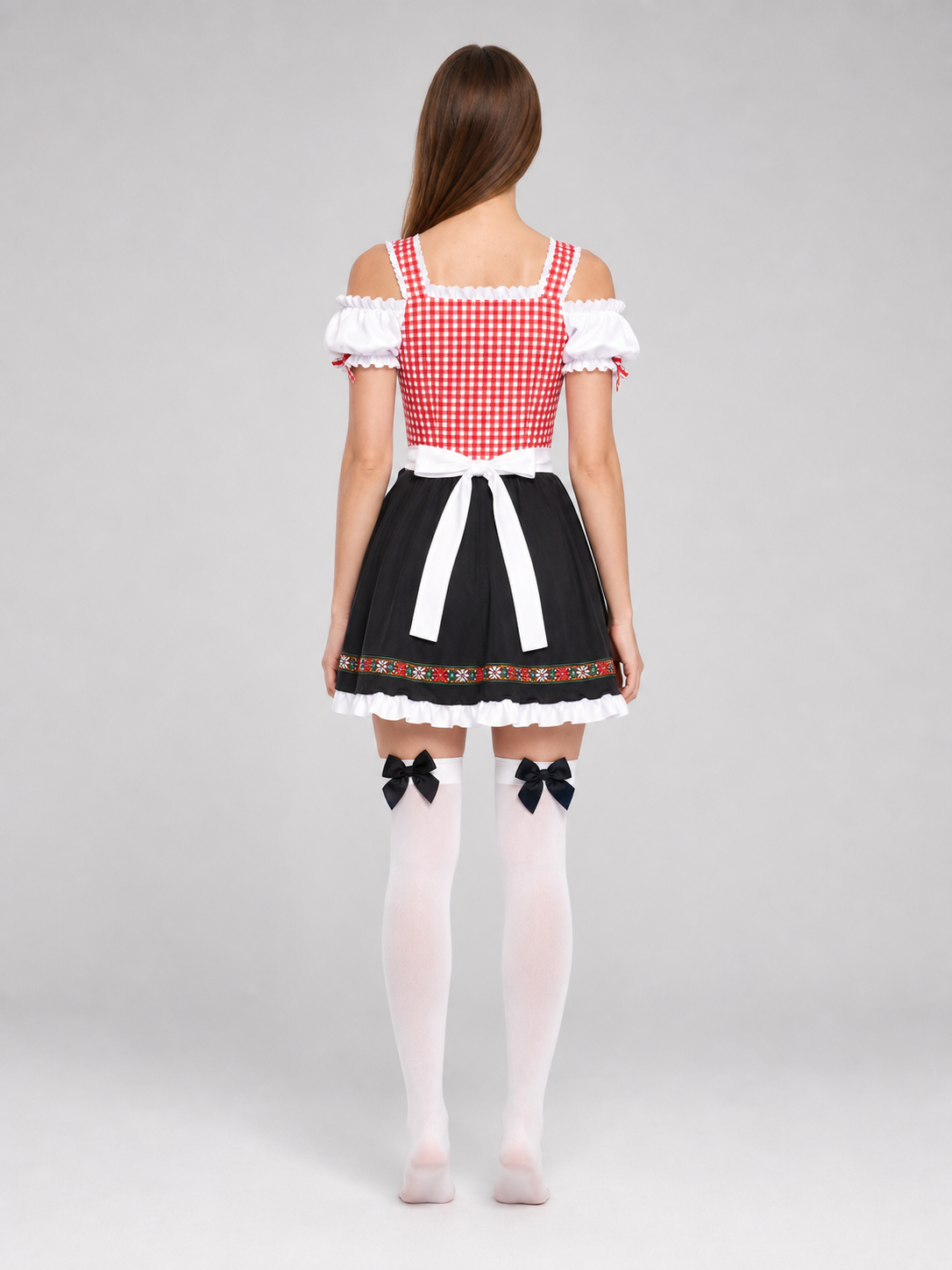 Historical national costume with apron and full skirt back view