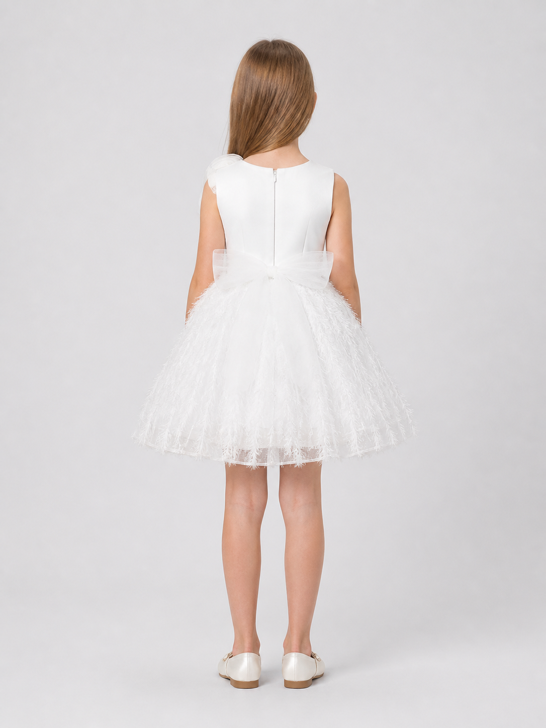 White Formal Dress with a Full Tulle Skirt and Roses