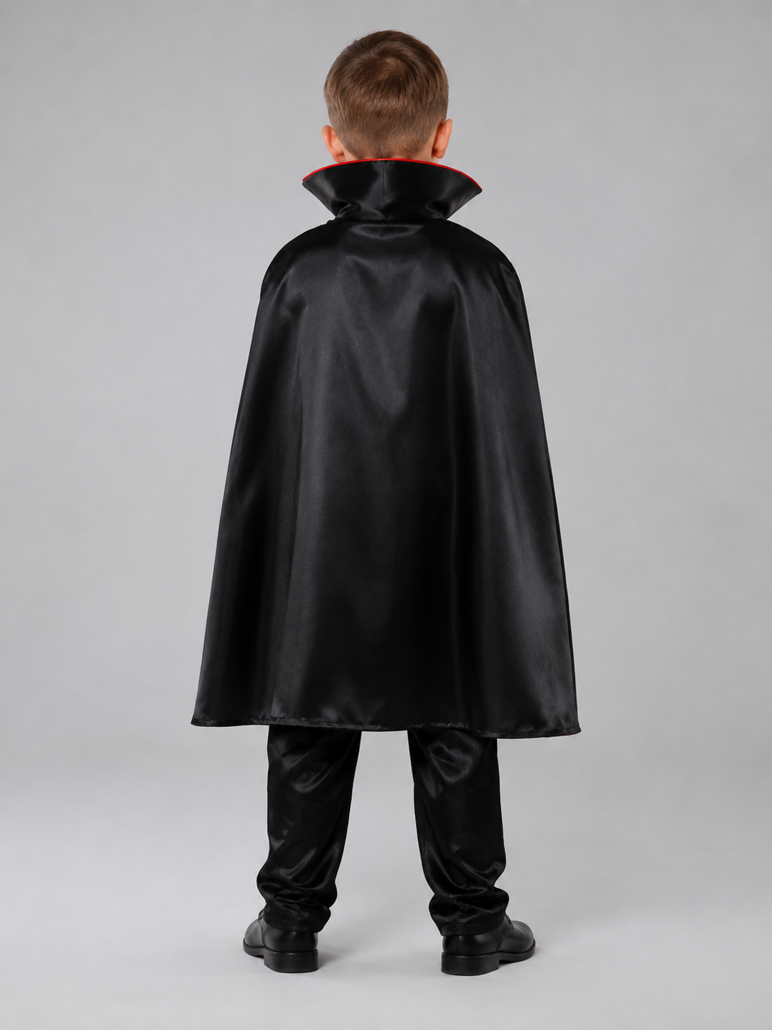 Children's vampire costume with cape, vest, and pants back view