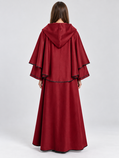 Long red hooded cloak with black trim