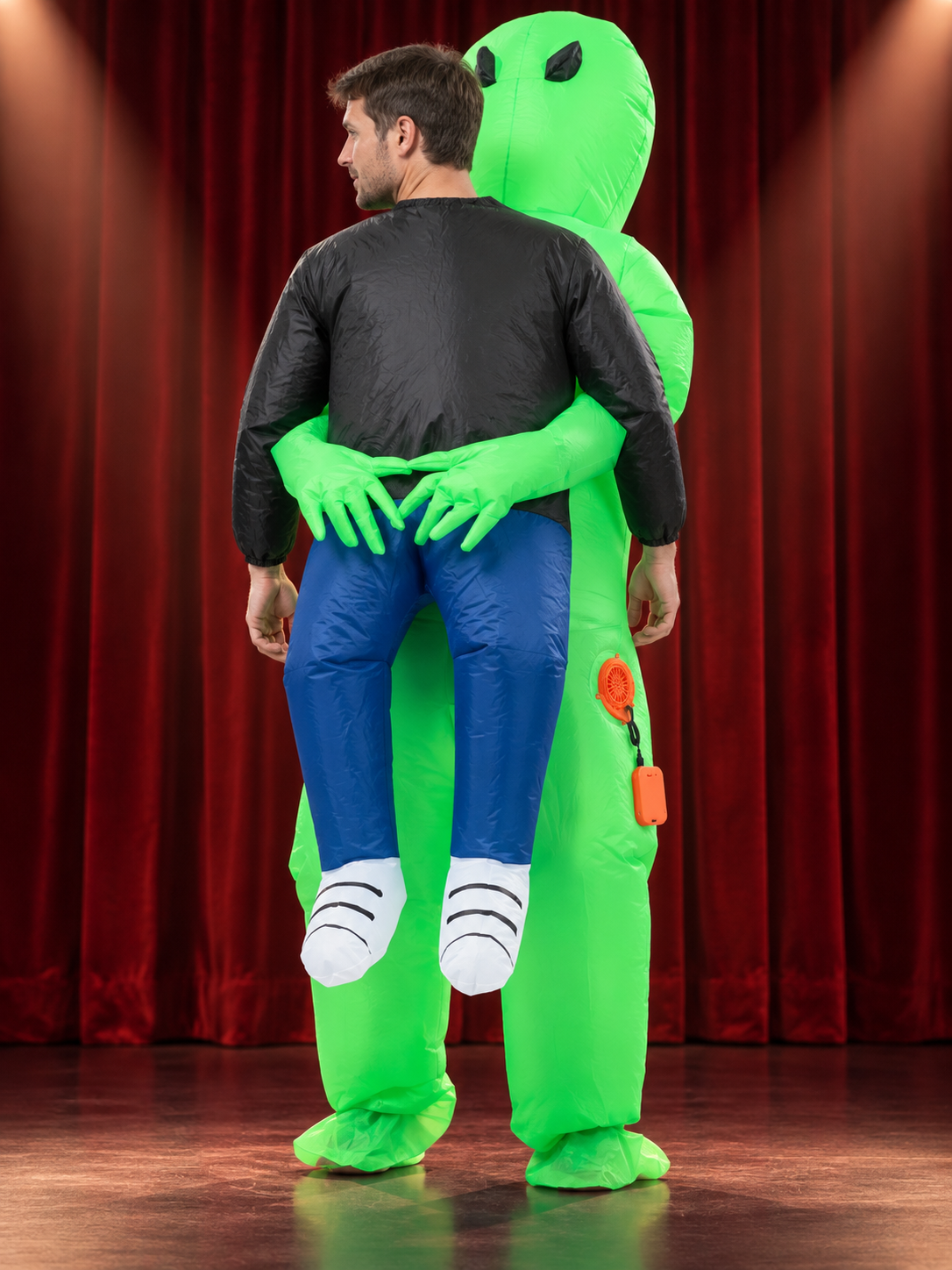 Green inflatable alien costume with black eyes