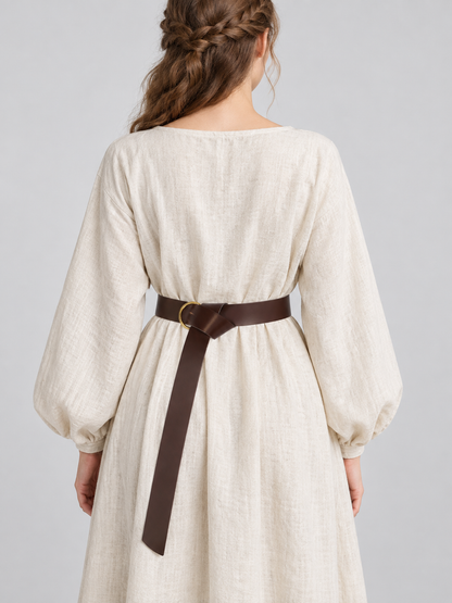 Long brown belt with metal ring