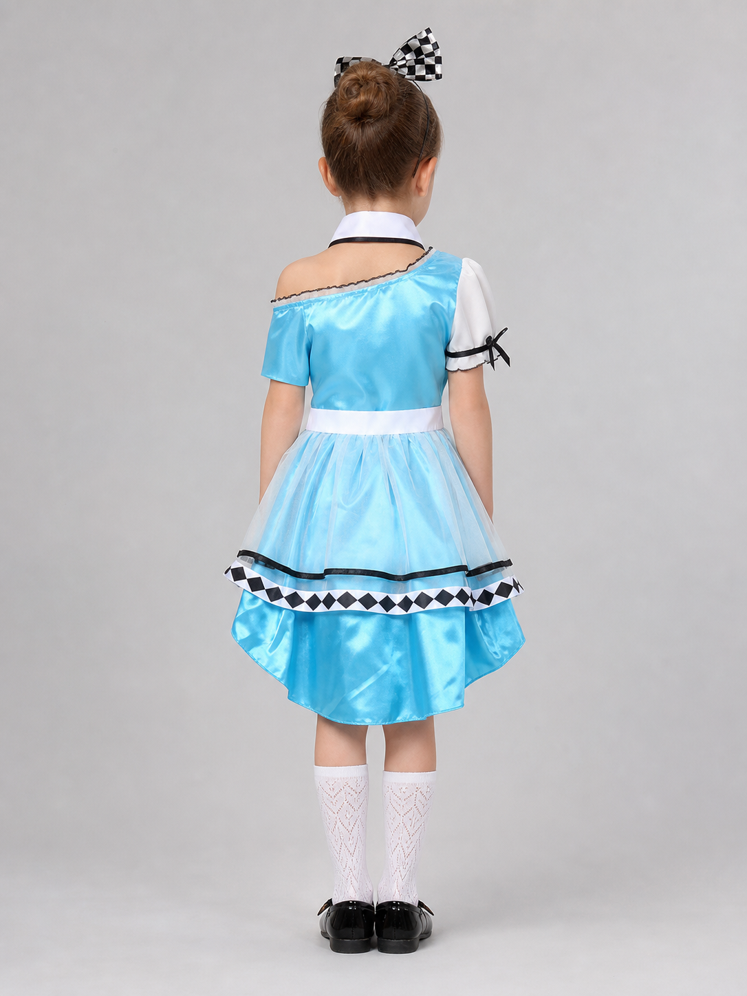 The set is designed as a cosplay dress with decorative princess-style details and includes a dress, a separate collar accessory, and a headband with a bow. The look is centered around a light blue dress with a full, layered skirt and a whit