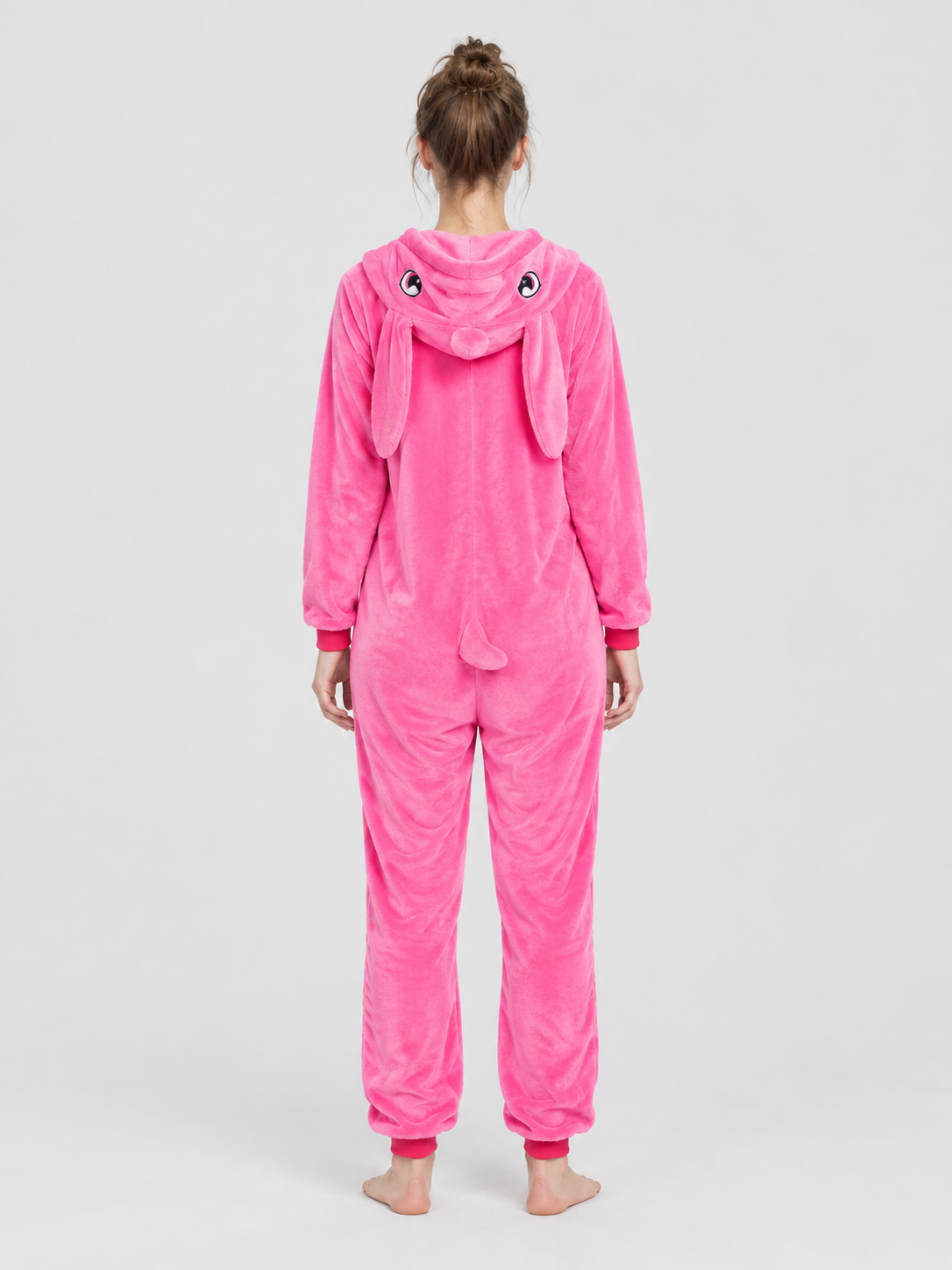 Pink pajama jumpsuit with hood, pocket, and zipper