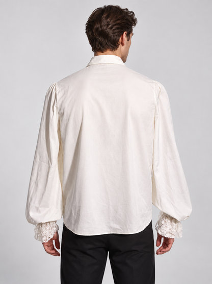 White shirt with a jabot and ruffles on the cuffs