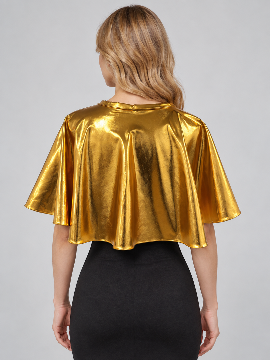 Short gold cape with ties at the neckline